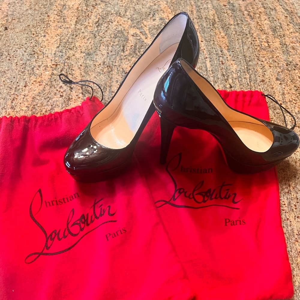Christian Louboutin platform heels. Size 38 with bags.   Worn twice